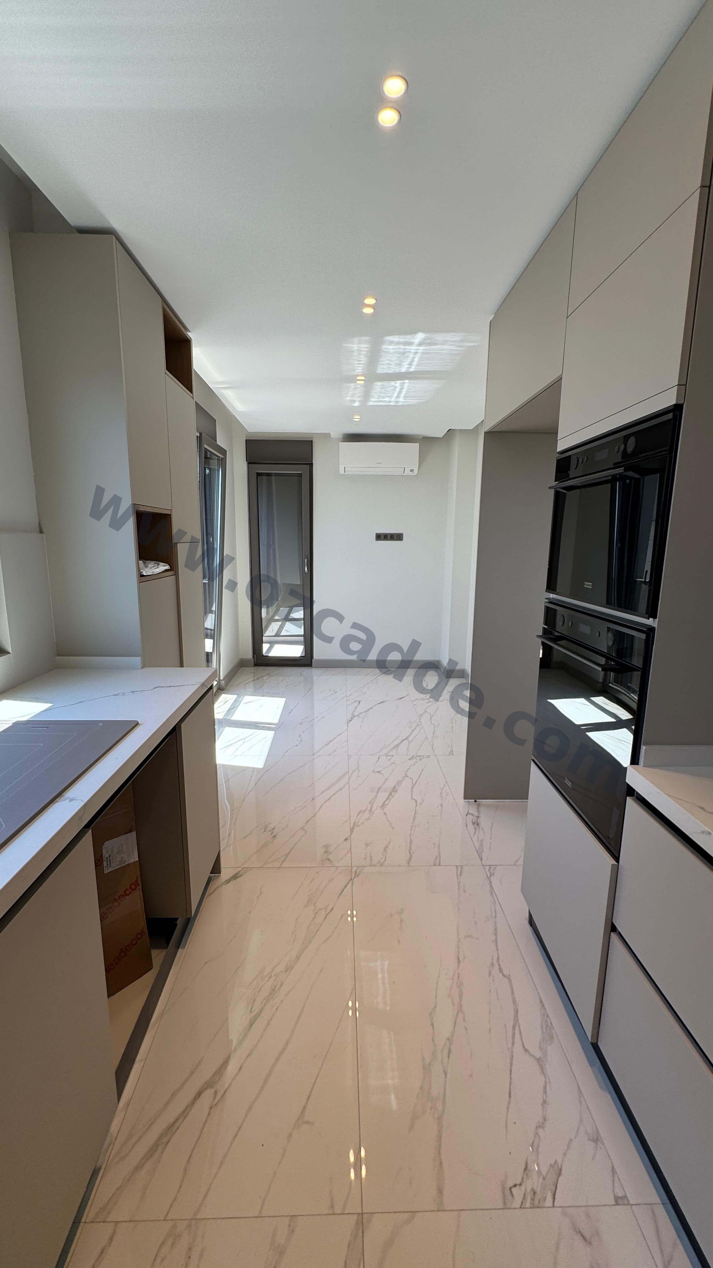 CADDEBOSTAN İSKELE SOKAKTA PANORAMİK DENİZ MANZARALI 4+1 LÜKS DAİRE görsel 11